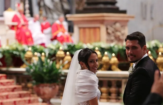 One of the 20 couples who were married by Pope Francis on Sept. 14, 2014 pose for a picture during the ceremony. ?w=200&h=150