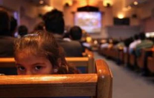 Opponents of Arizona's new immigration enforcement law attend a prayer serivce on April 25, 2010 in Phoenix, Arizona.   John Moore/Getty Images News/Getty Images