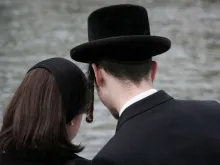 Orthodox Jewish couple. Stock photo via Shutterstock.