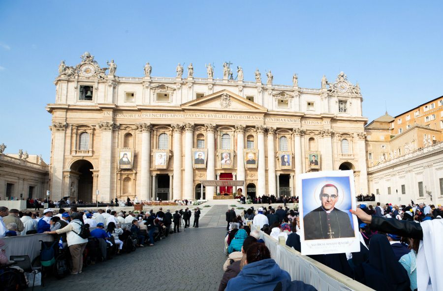 Pilgrims in St. Peter’s Square hold up an image of Saint Oscar Romero at his canonization Mass Oct. 14. ?w=200&h=150