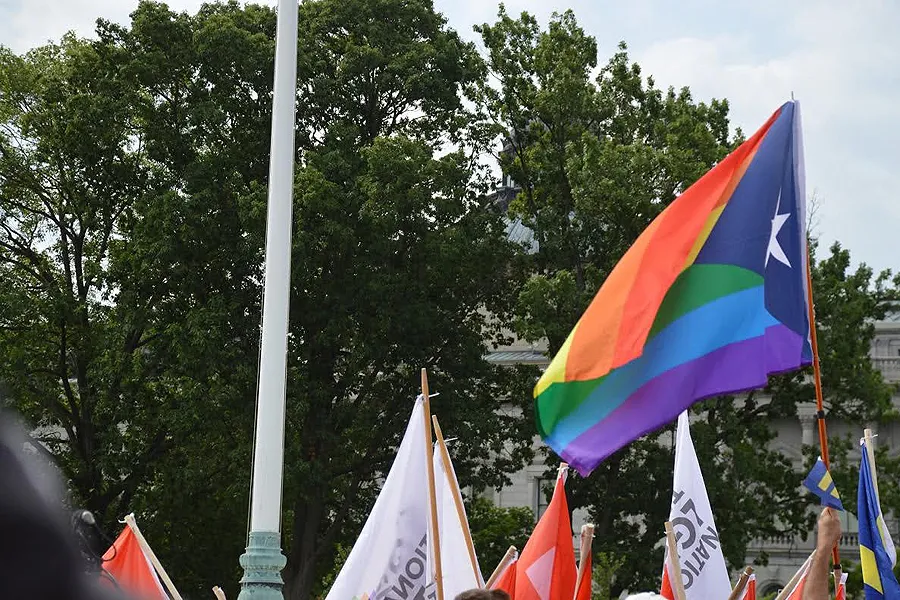Protestors outside of the Supreme Court in Washington DC during the courts ruling in favor of legalizing gay marriage on June 26, 2015. ?w=200&h=150