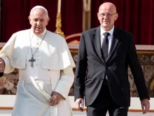 Pope Francis and Domenico Giani walk together on Oct. 13 at the Vatican. 