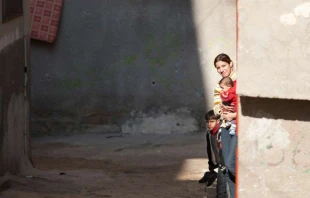Palestinian family in refugee camp.   dominika zarzycka/Shutterstock