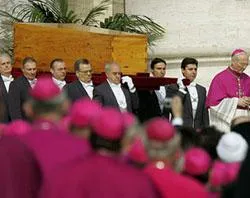 Pallbearers carry the casket of John Paul II at his funeral?w=200&h=150