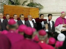 Pallbearers carry the casket of John Paul II at his funeral