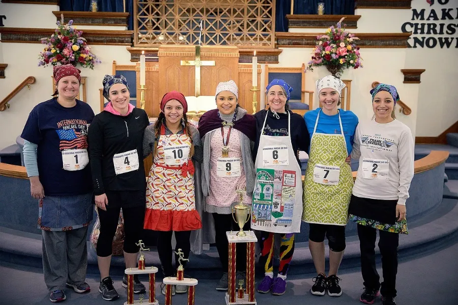 Competitors in the 2018 International Pancake Race from Liberal, Kansas, pose afterwards. Courtesy photo.?w=200&h=150