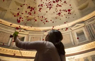 Rose petals shower from the ceiling of the Pantheon, a Pentecost tradition in Rome symbolizing the descent of the Holy Spirit.   Marina Testino/CNA.
