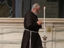 Papal Preacher Fr. Raniero Cantalamessa after giving the homily during Good Friday's Passion liturgy on April 18, 2014 