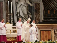 Pope Francis ordains a priest in St. Peter's Basilica, April 26, 2015. 