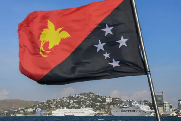 Papua New Guinea flag flies ahead of the Nov. 17-18 APEC summit. . James D. Morgan / Getty Images News.
