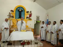The Communities of Missionary Families have Mass with Archbishop Valenzuela of Asuncion before dispersing along the Paraguay River. 