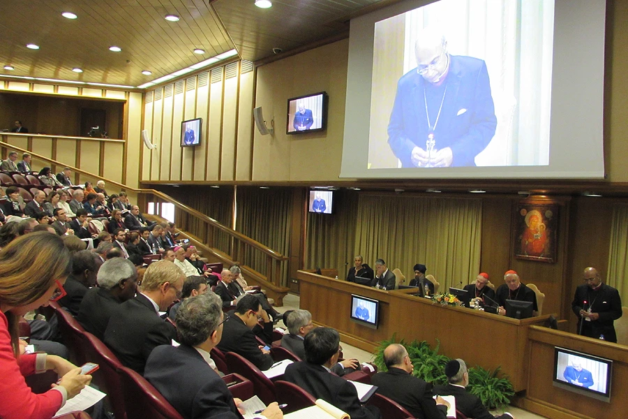 Participants listen to a presentation at the Human Colloquium in the Vatican's Synod Hall, Nov. 18, 2014. ?w=200&h=150