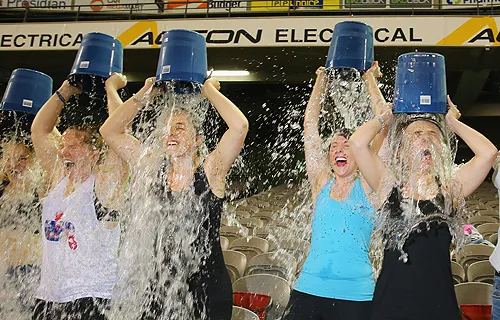 Participants tip buckets of ice water over their heads for the Ice Bucket Challenge in Melbourne, Australia, Aug. 22, 2014. ?w=200&h=150
