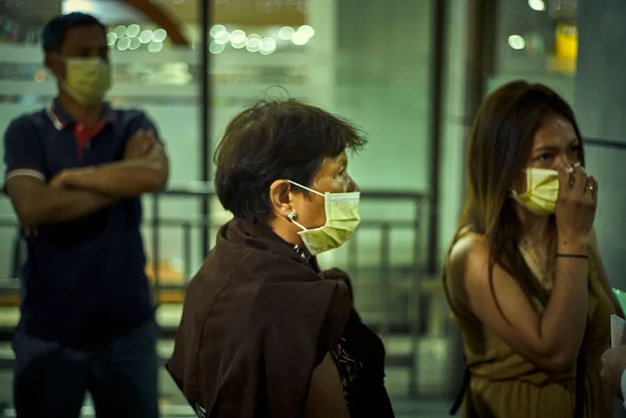 Passengers are screened at an airport in Manila, Philippines following a coronavirus outbreak in China. ?w=200&h=150