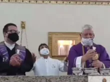 Fr. Jose Carlos Pedrini, CS, (R) attempts to concelebrate Mass with Francisco Leite, a Presbyterian minister, (L) in Jundiai, Brazil, Feb. 17, 2021. (screenshot)