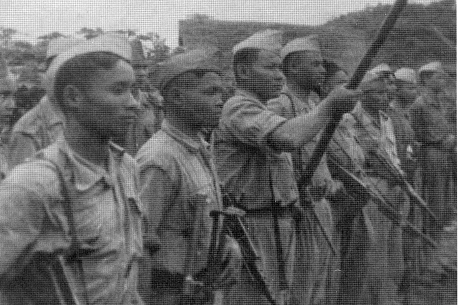 Guerilla fighters of the Pathet Lao, the group which martyred Fr. Mario Borzaga and Paul Thoj Xyooj in Laos in April 1960, seen in Sam Nuea, 1953. ?w=200&h=150