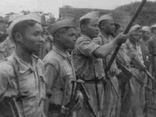 Guerilla fighters of the Pathet Lao, the group which martyred Fr. Mario Borzaga and Paul Thoj Xyooj in Laos in April 1960, seen in Sam Nuea, 1953. 