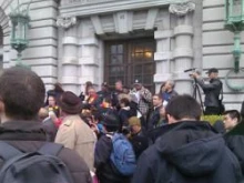 People gather outside the James R. Browning U.S. Courthouse in San Francisco, Calif. 