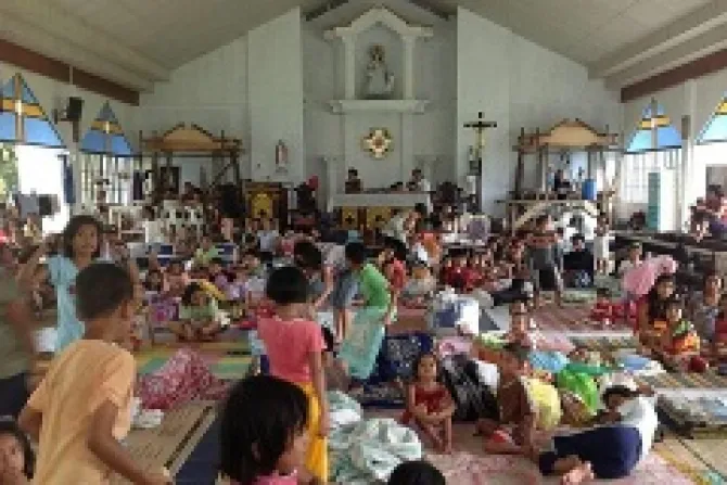 People take shelter in a parish church in the Philippines after Typhoon Haiyan swept through the area Credit Caritas Manila CNA 11 11 13