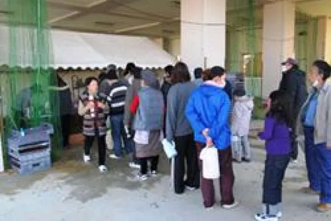 People wait in line for hot water Credit Caritas CNA World Catholic News 6 9 11