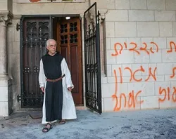 Vandals sprayed blasphemous graffiti on the walls and set fire to the door of the Abbey of Latroun. ?w=200&h=150