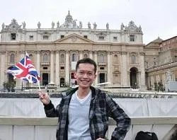 Peter Ho stands in the first row of St. Peter's Square?w=200&h=150