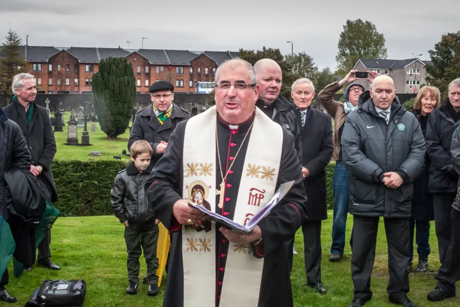 Archbishop Philip Tartaglia gives a blessing at a commemoration of the founding fathers of Celtic F.C. at St Peter’s Cemetery, Dalbeth, Glasgow, Nov. 2, 2013. Credit: PaulVIF (CC BY-SA 3.0).?w=200&h=150