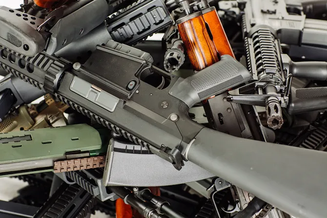 Pile of machine guns Credit KANINstudio via wwwshutterstockcom CNA