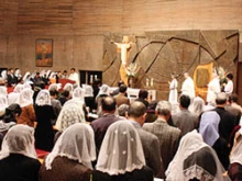 Catholics pray at Shiroyama church. 