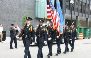 Police officers preparing for the 18th Annual Blue Mass in Washington, D.C., May 8, 2012.   National Law Enforcement Officers Memorial Fund via Flickr (CC BY-NC 2.0).