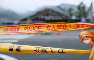 Police crime tape closes the entrance of Tsukui Yamayuri En care home on July 27, 2016 in Sagamihara, Japan.   Ken Ishii/Getty Images.