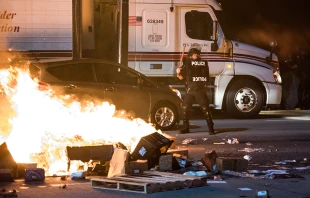 Police officer on I-85 during protests following the death of a man shot by police in Charlotte, NC on Sept. 21, 2016.   Sean Rayford, Getty Images.