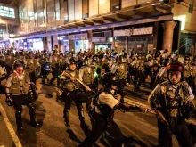 Police officers disperse protesters outside Po Lam Station on Sept. 5, 2019 in Hong Kong. 