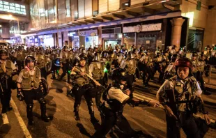 Police officers disperse protesters outside Po Lam Station on Sept. 5, 2019 in Hong Kong.   Anthony Kwan / Getty Images.