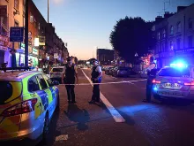 Police officers guard a road leading to Finsbury Park Mosque after an incident in which a van hit worshippers outside the building on June 19, 2017 in London, England. 