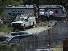 Police shut down a ramp where an Amtrak train derailed in Philadelphia, PA on May 13, 2015. 