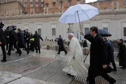 Pop Francis ascends the stairs leading up to the platform from which he will speak during his Feb. 5, 2014 General Audience ?w=200&h=150