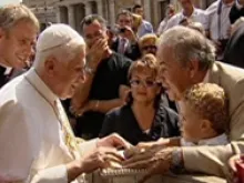 Pope Benedict XVI greeting the faithful during the general audience