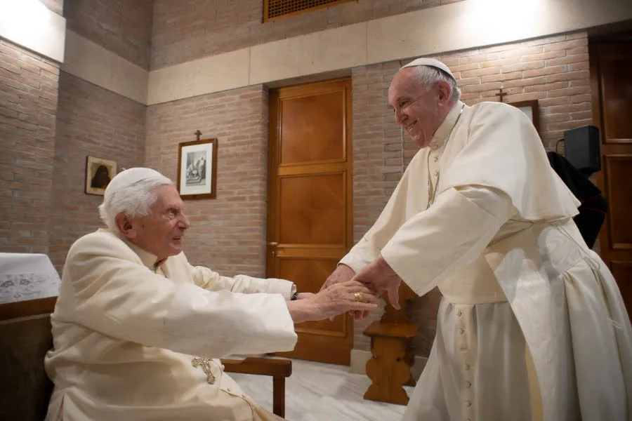 Pope Francis greets Pope emeritus Benedict XVI at the Vatican’s Mater Ecclesiae Monastery on Nov. 28, 2020. Credit: Vatican Media.