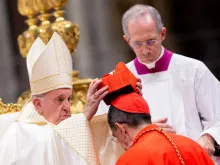 Pope Francis places the red biretta on Cardinal Miguel Ángel Ayuso Guixot Oct. 5, 2019. 