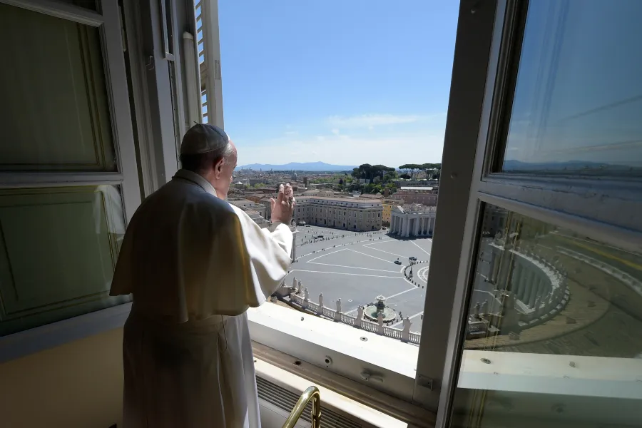 Pope Francis offers a blessing from the window of the Apostolic Palance April 26, 2020. ?w=200&h=150