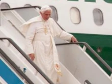 Pope Benedict XVI deplanes at World Youth Day. 