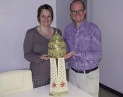 Milka Botcheva and Dieter Philippi display Pope Benedict's tiara.?w=200&h=150