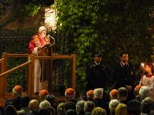 Pope Benedict XVI addresses the crowd in front of the shrine to Our Lady of Lourdes in the Vatican Gardens on May 31, 2012.