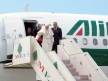 Pope Benedict XVI arrives in Lebanon. 