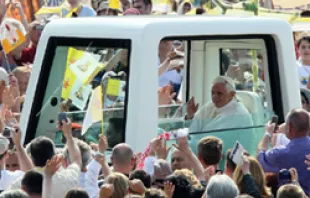 Pope Benedict moves through the crowd in his popemobile at World Youth Day in Madrid.   Official WYD flickr.com-madrid11