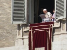 Pope Benedict XVI gives the Angelus in St. Peter's Square Jan. 27, 2013. 