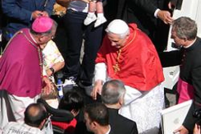 Pope Benedict XVI greets attendees after Mass CNA
