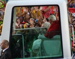 Pope Benedict XVI is greeted by pilgrims. ?w=200&h=150