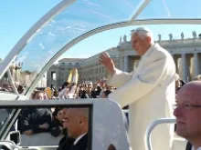 Pope Benedict XVI rides through St. Peter's Square before his Nov. 7, 2012 general audience. 